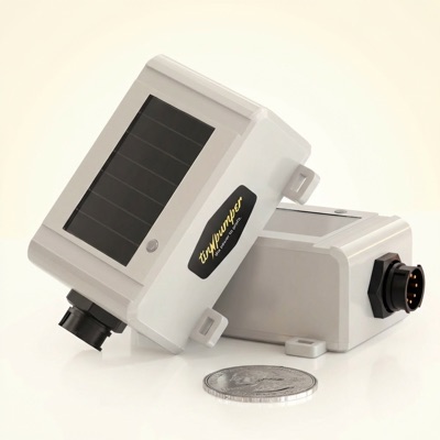 TinyPumper matchbox-sized solar power gateway (quarter for scale)